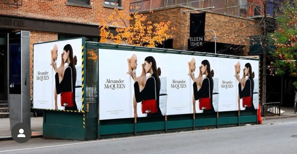 Outdoor dining structure wrapped in a fashion brand advertising campaign